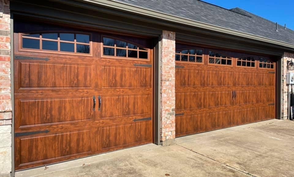 two garage door home with wooden steel design