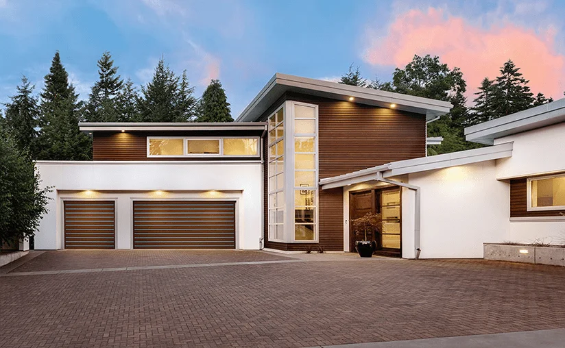 modern home with brown clopay canyon ridge garage door