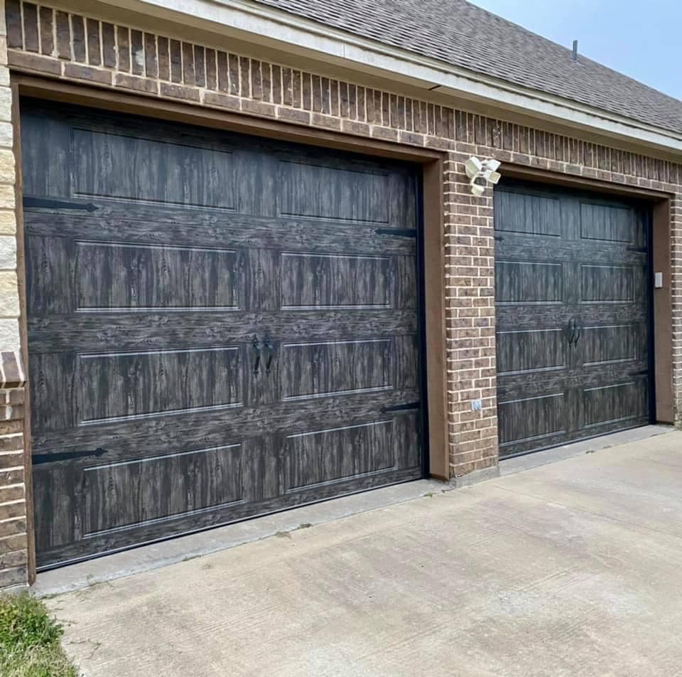 two clopay gallery steel garage doors with a slate design
